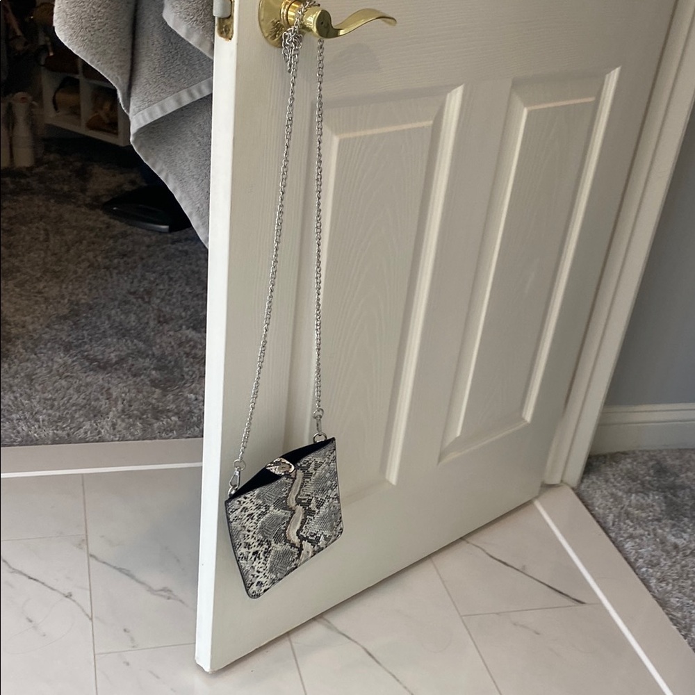 Elegant Black and White Snake Print Chain Bag